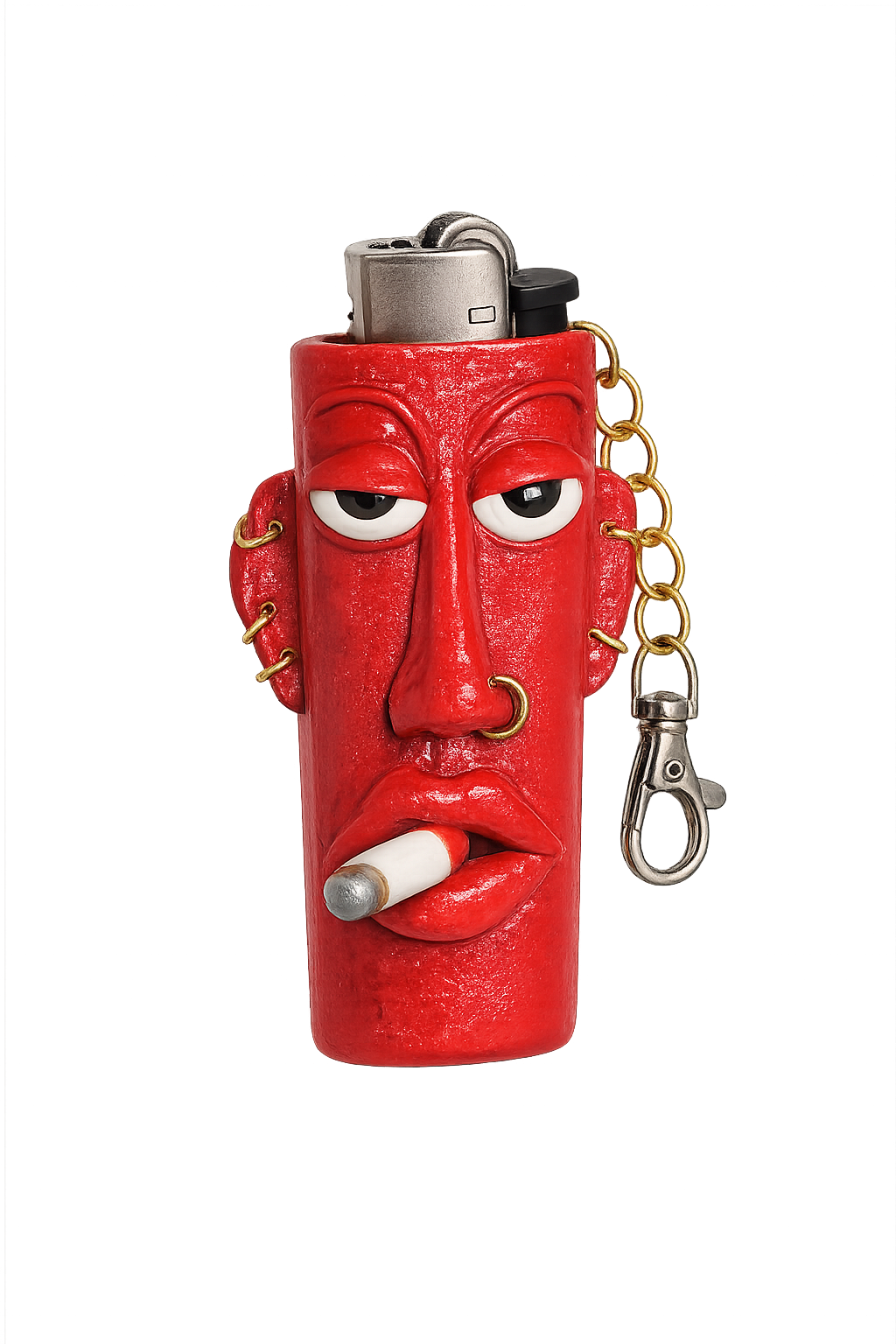 A red lighter case shaped like a stylized face with a cigarette in its mouth, featuring a silver metal top and a gold-and-silver keychain attached.