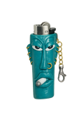 A turquoise blue lighter shaped like a stylized face with gold wire details, a silver metal top, and a gold-and-silver keychain clasp, shown on a plain white background.

Teal With It handmade teal polymer clay lighter holder with keychain