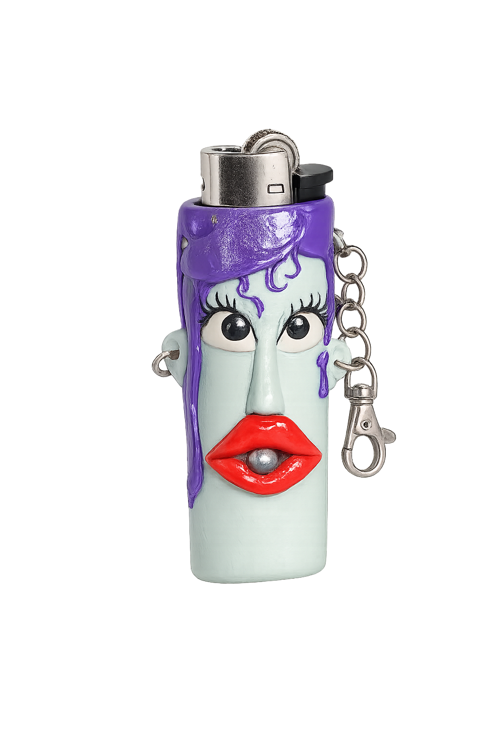A purple hair, large eyes, red lips, and a silver metal keychain attached, shown on a plain white background. 

Violet Vice purple handmade polymer clay BIC lighter case with keychain.